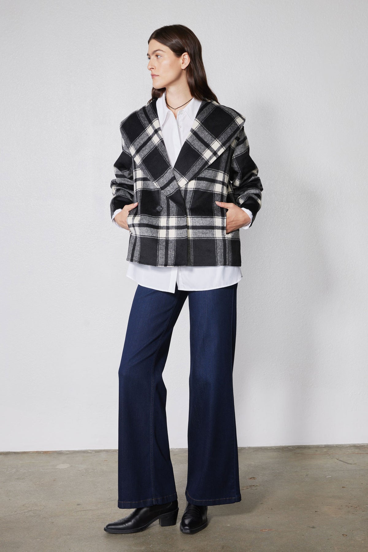 Cropped plaid wool coat with long sleeves, patch pockets, and button front, black/white