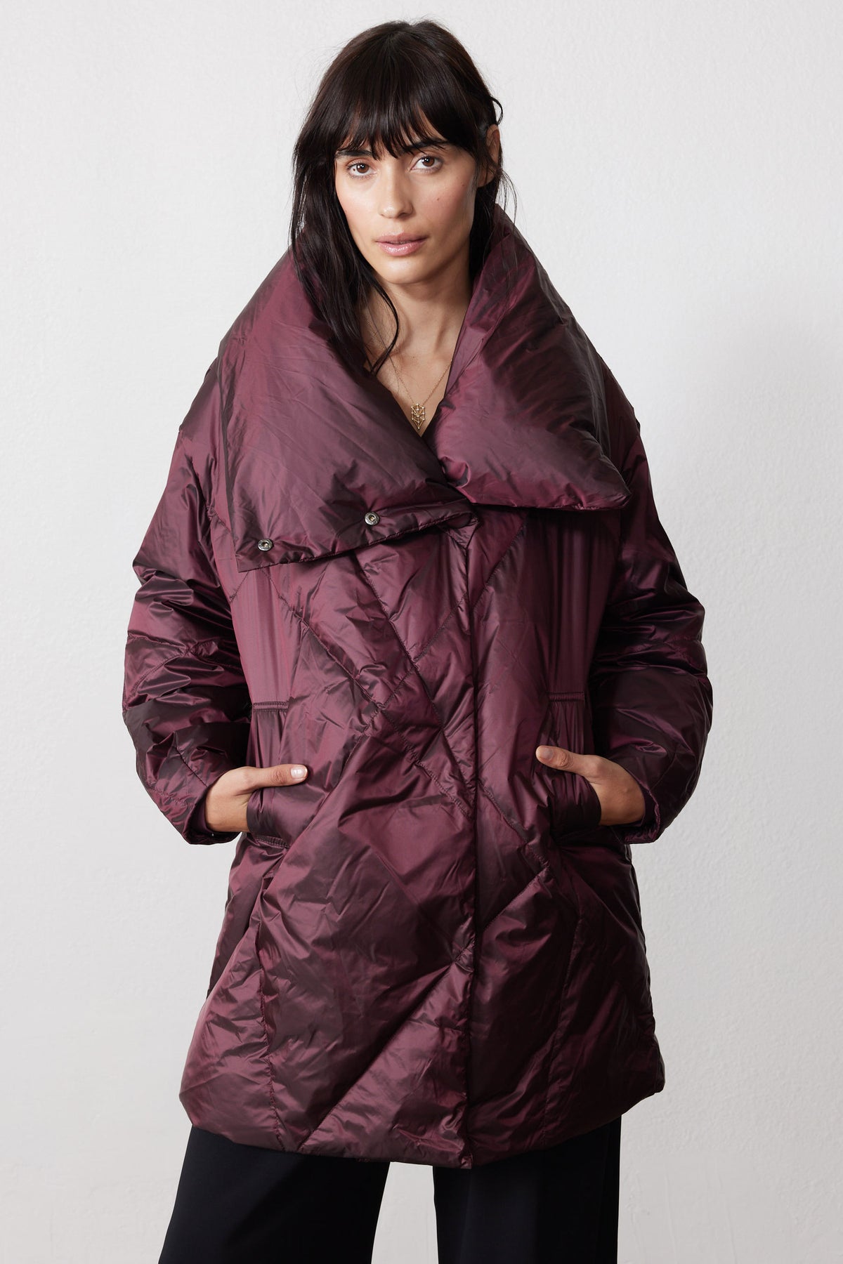 Mulberry puffer jacket with an oversized folded collar, snap details, and front pockets