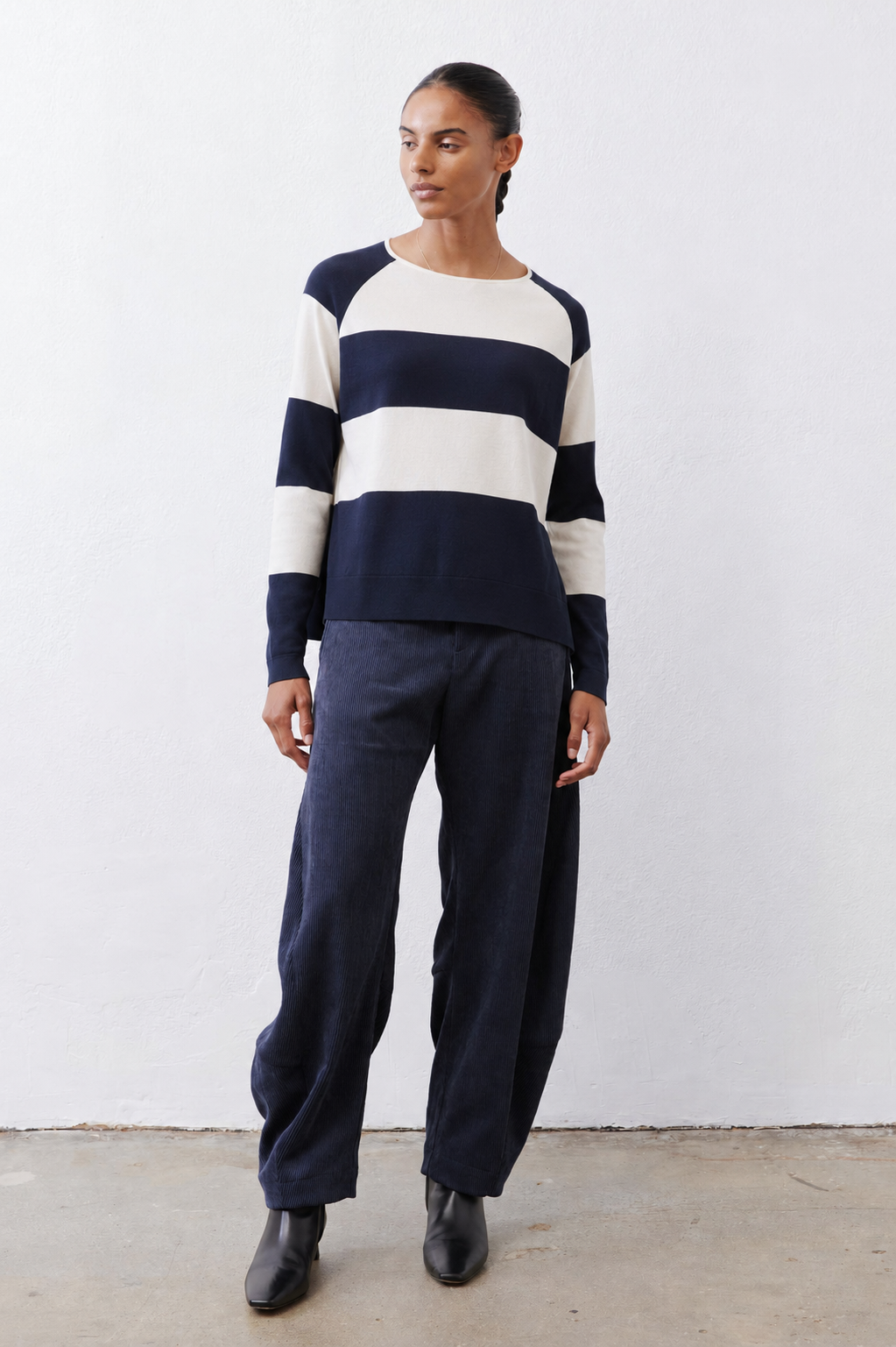 Navy and cream striped raglan sweater with crew neck and long sleeves
