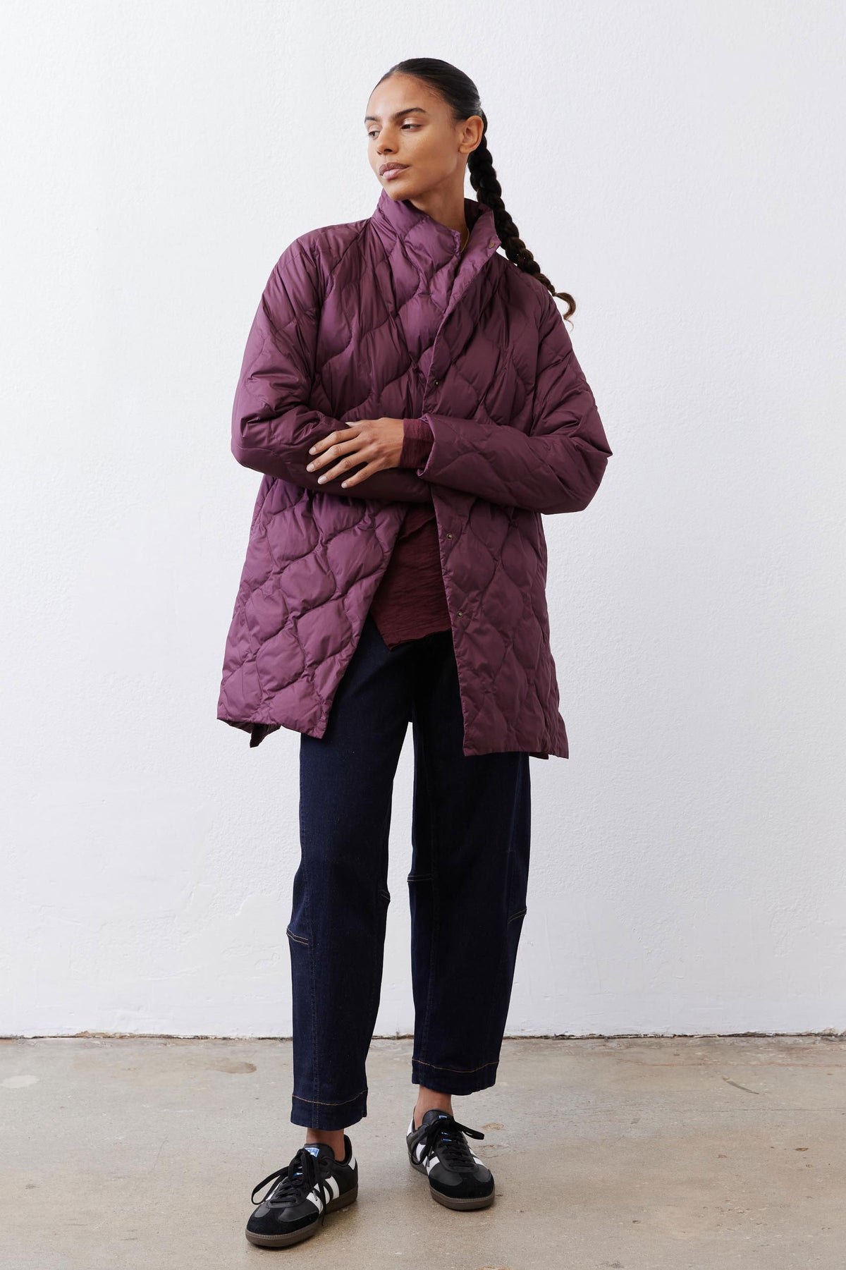 Deep plum hooded down puffer coat with stand collar and quilted body