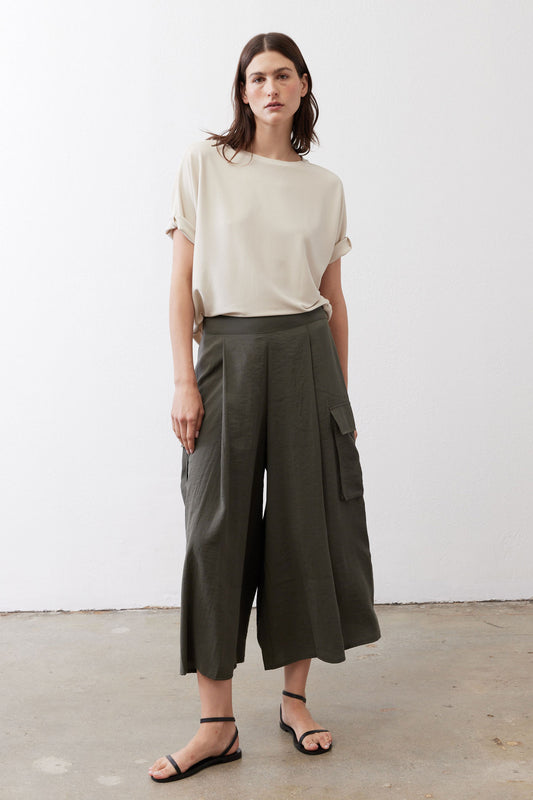 Cloud cream short-sleeve button top with crew neck and relaxed drape