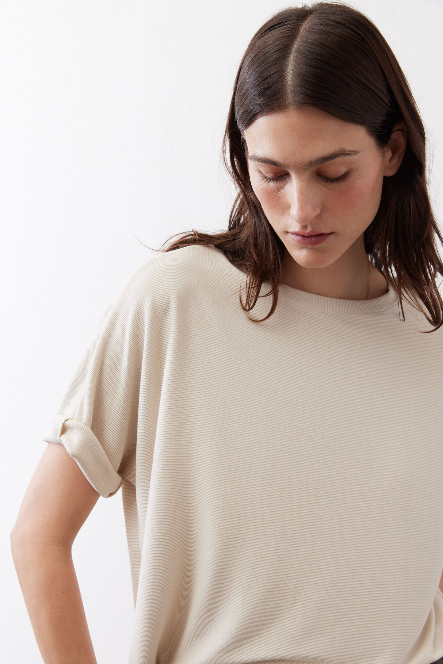 Cloud cream short-sleeve top with crew neck and side cuff detail