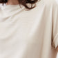 Cloud cream short-sleeve top with fine textured knit and crew neckline