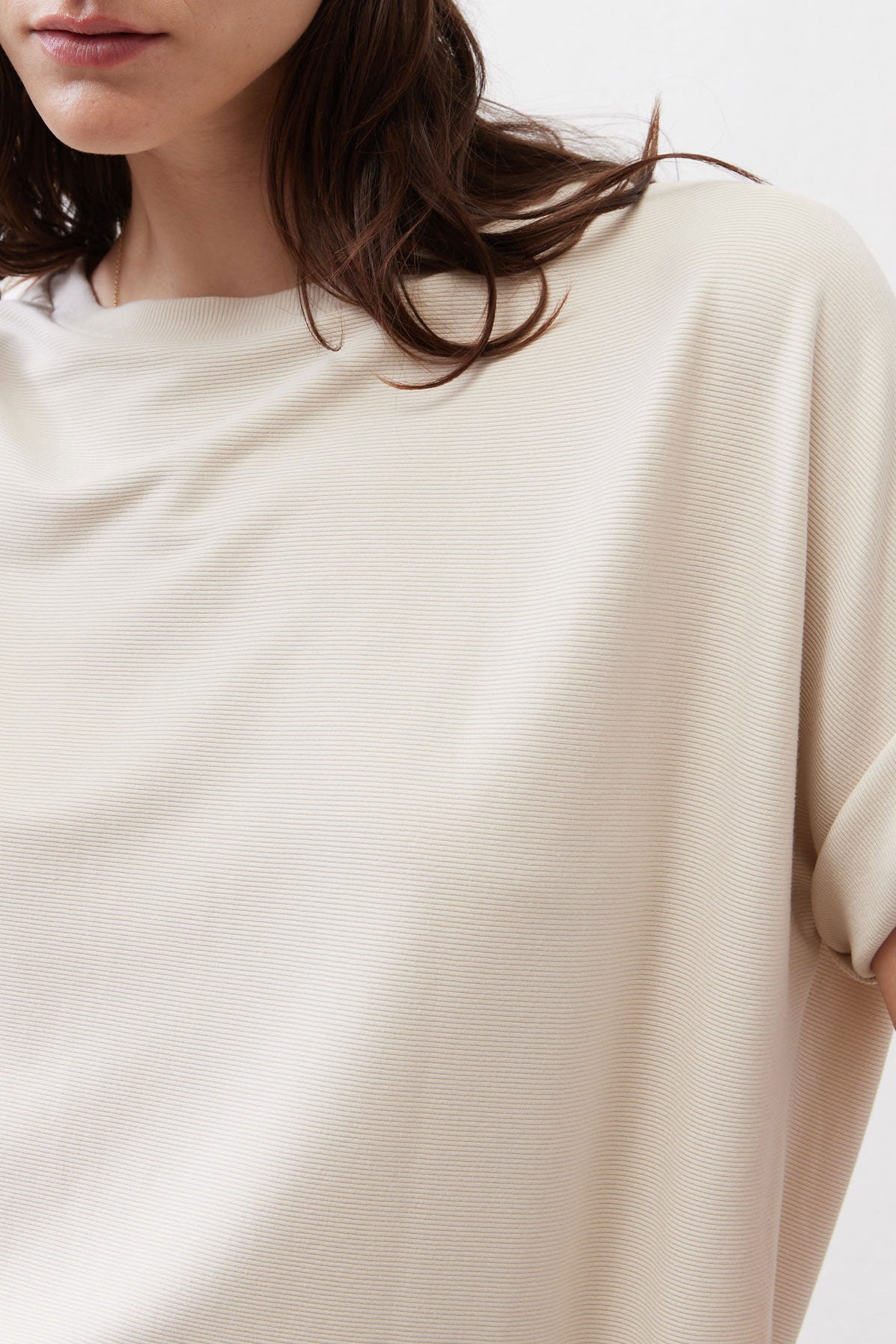Cloud cream short-sleeve top with fine textured knit and crew neckline