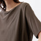 Olive short-sleeve knit top with textured weave and loose drape