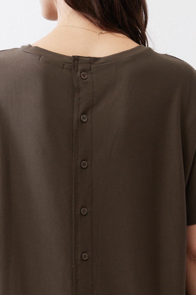 Olive short-sleeve top back close-up with button placket and ribbed texture