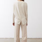 Cloud button-back long-sleeve top, back view with buttoned seam