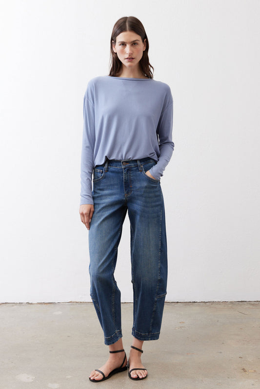 Light blue long-sleeve crewneck top with button placket at back