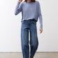 Light blue long-sleeve crewneck top with relaxed fit and curved hem