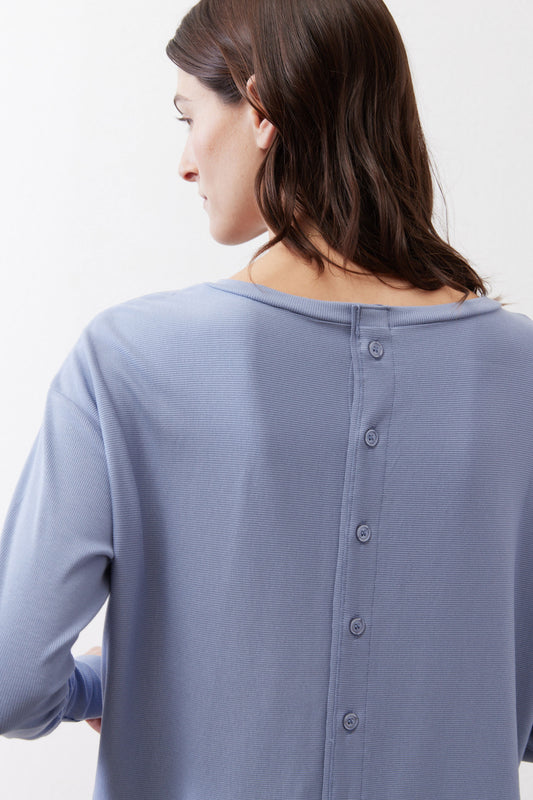 Cottage Blue back neckline with button placket and gathered hem detail