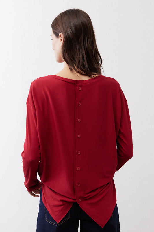 Garnet long-sleeve top with buttoned back and gathered waist tie