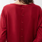 Garnet button-back long-sleeve top, button placket at back yoke
