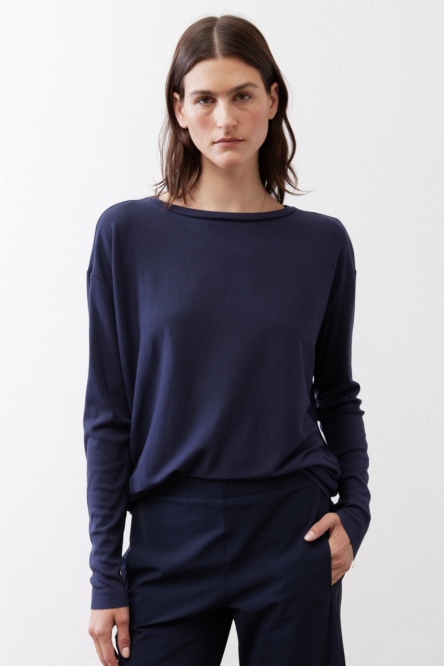 Deep navy long-sleeve top with round neckline and relaxed fit