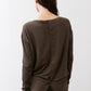Essential button-back top showing back buttons, long sleeves in dark olive