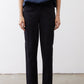 Black slim pants with cargo-style front pockets and straight ankle cuffs