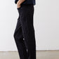Black slim pants with side cargo pockets and tapered ankle
