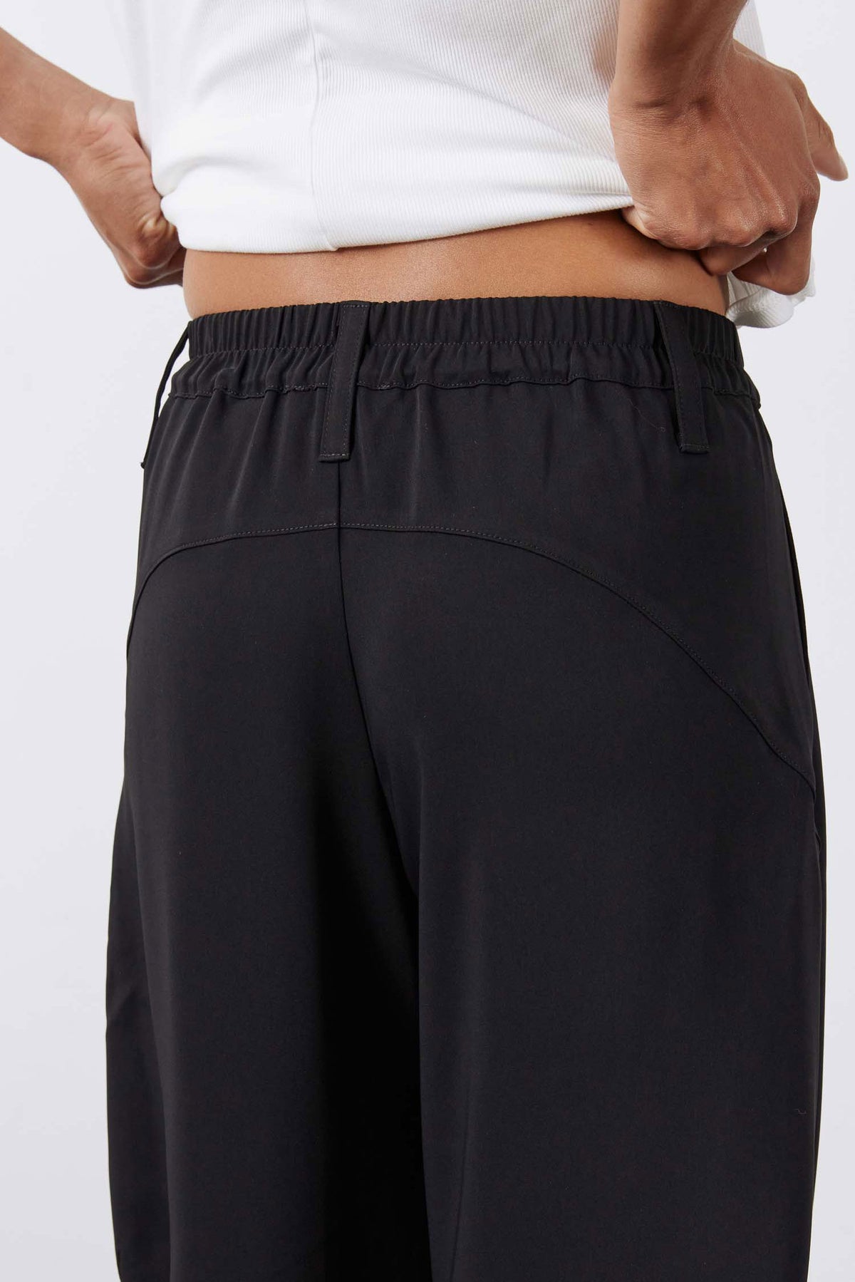 Black wide-leg formal pants with elastic waistband and side pockets