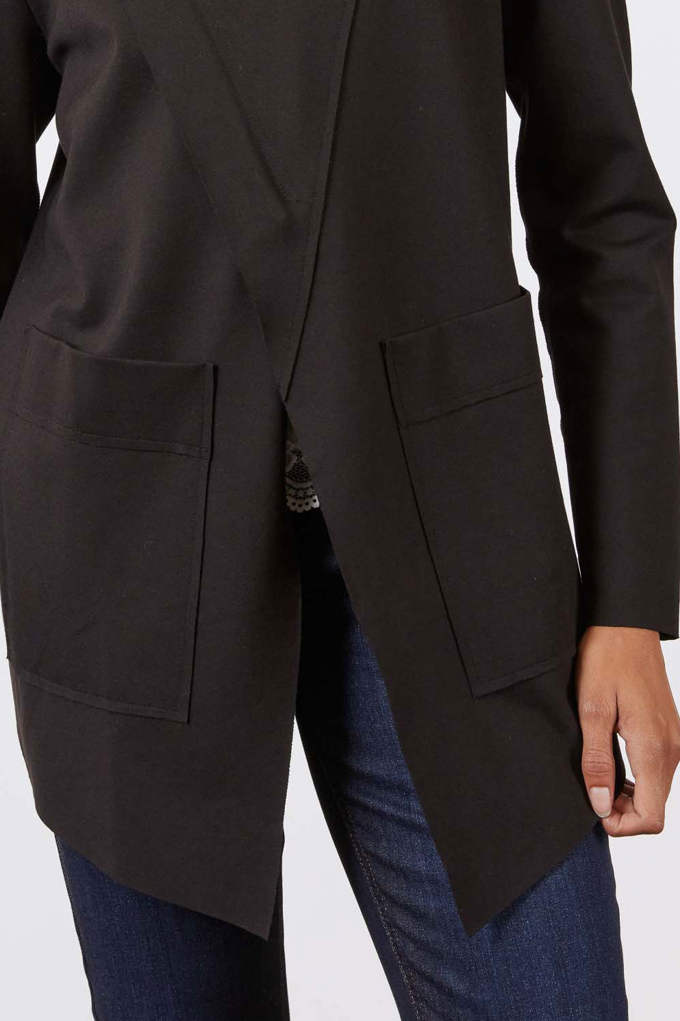 Black jacket with two flap patch pockets and long sleeves