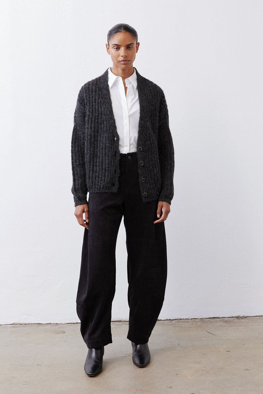 Heathered charcoal knit cardigan with button front and ribbed cuffs