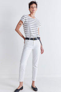 Vintage white slim-fit jeans with high-rise waist, belt loops, and pockets