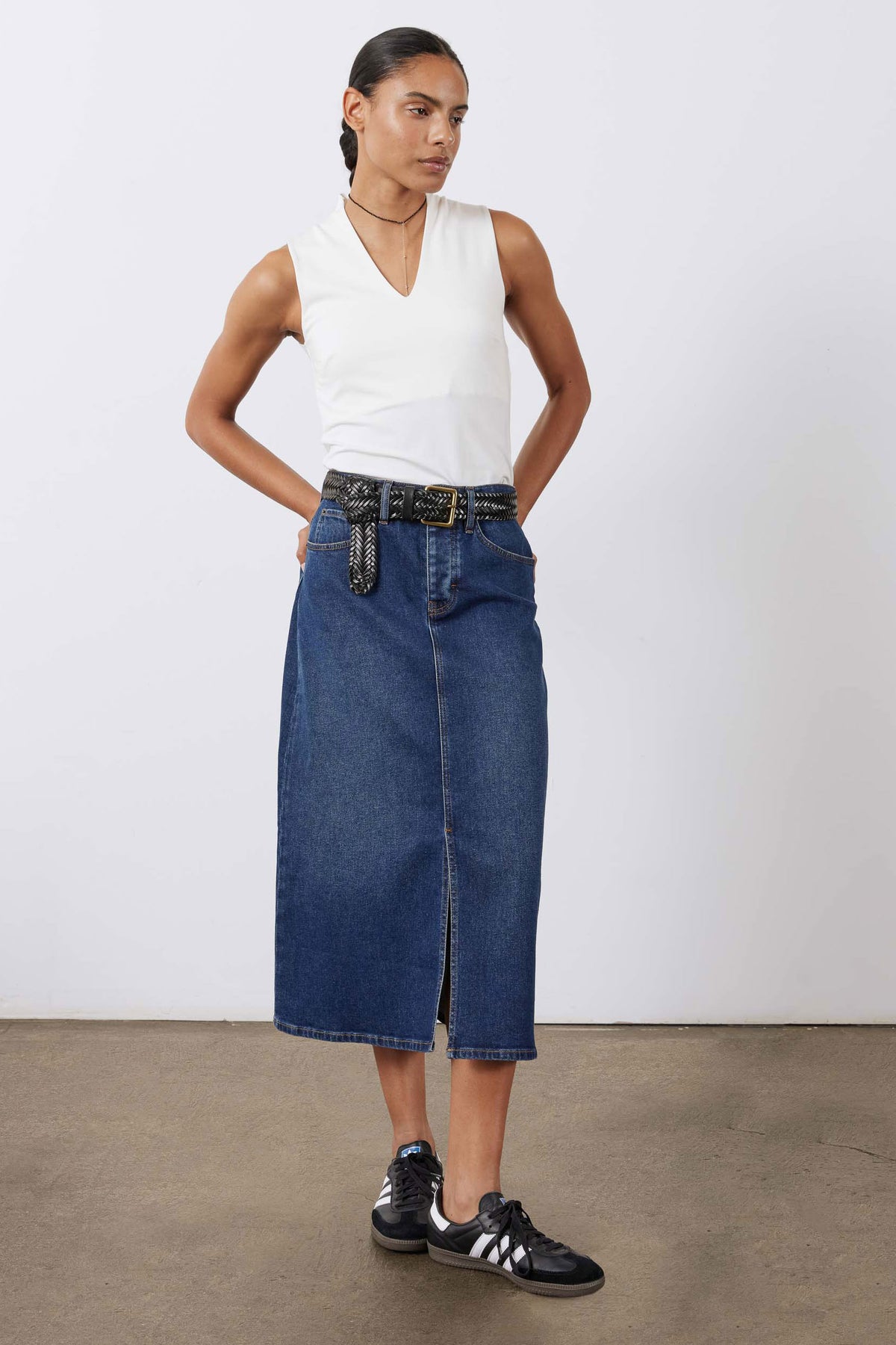 Women’s denim midi skirt with front slit and textured belt, medium wash blue