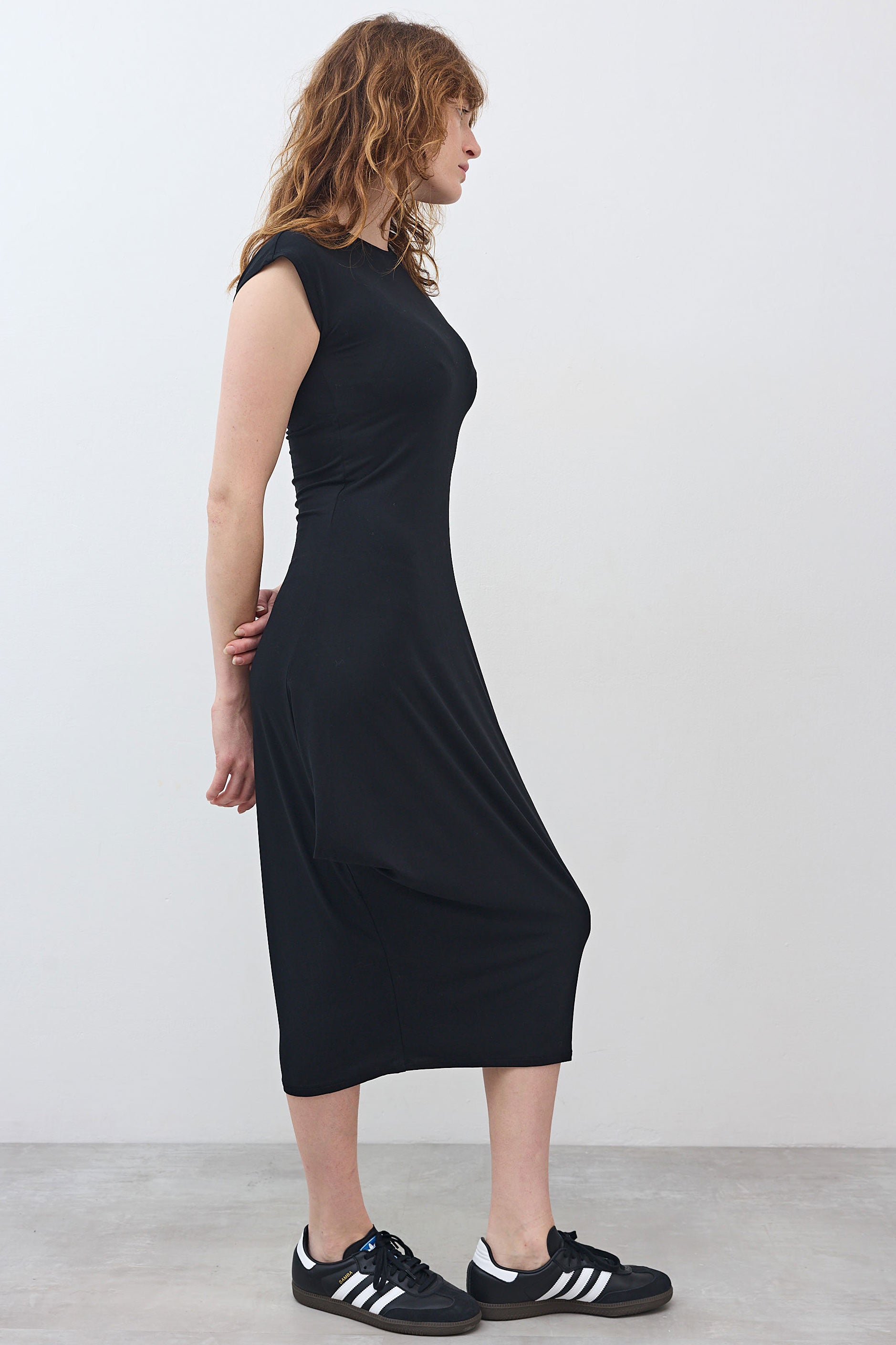 Black short-sleeve jersey dress, back and side view, midi length