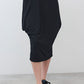 Black short-sleeve jersey dress, midi length, draped skirt detail at side