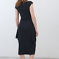 Black short-sleeve jersey dress, back view, side drape detail, midi length