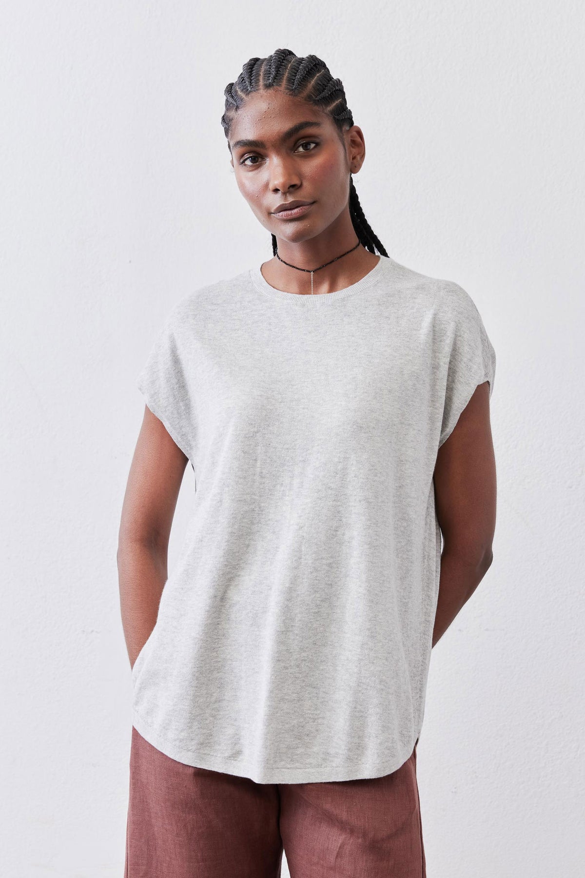 Light sweater top, heather light gray with short sleeves and crew neckline