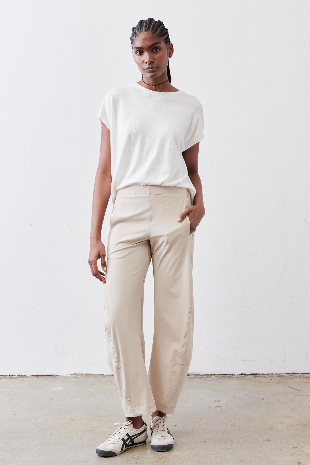 White light sweater top with crew neck and short sleeves, front view