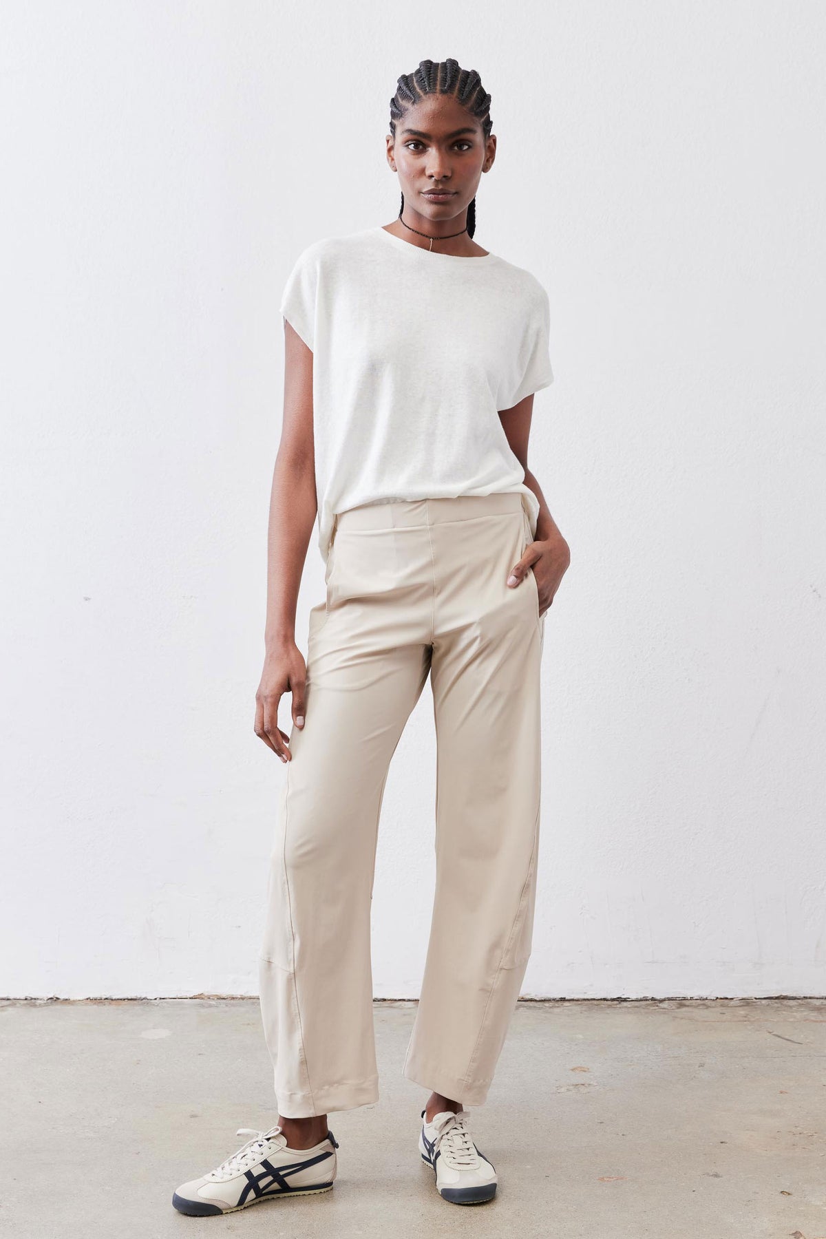 White light sweater top with crew neck and short sleeves, standing front view