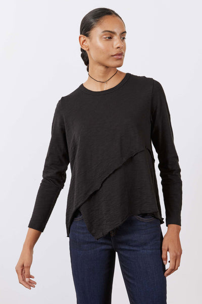 Asymmetric long sleeve top, black with angled front hem and crew neck.