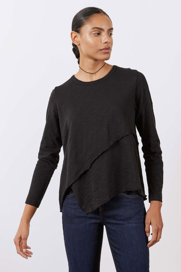 Asymmetric long sleeve top, black with angled front hem and crew neck.