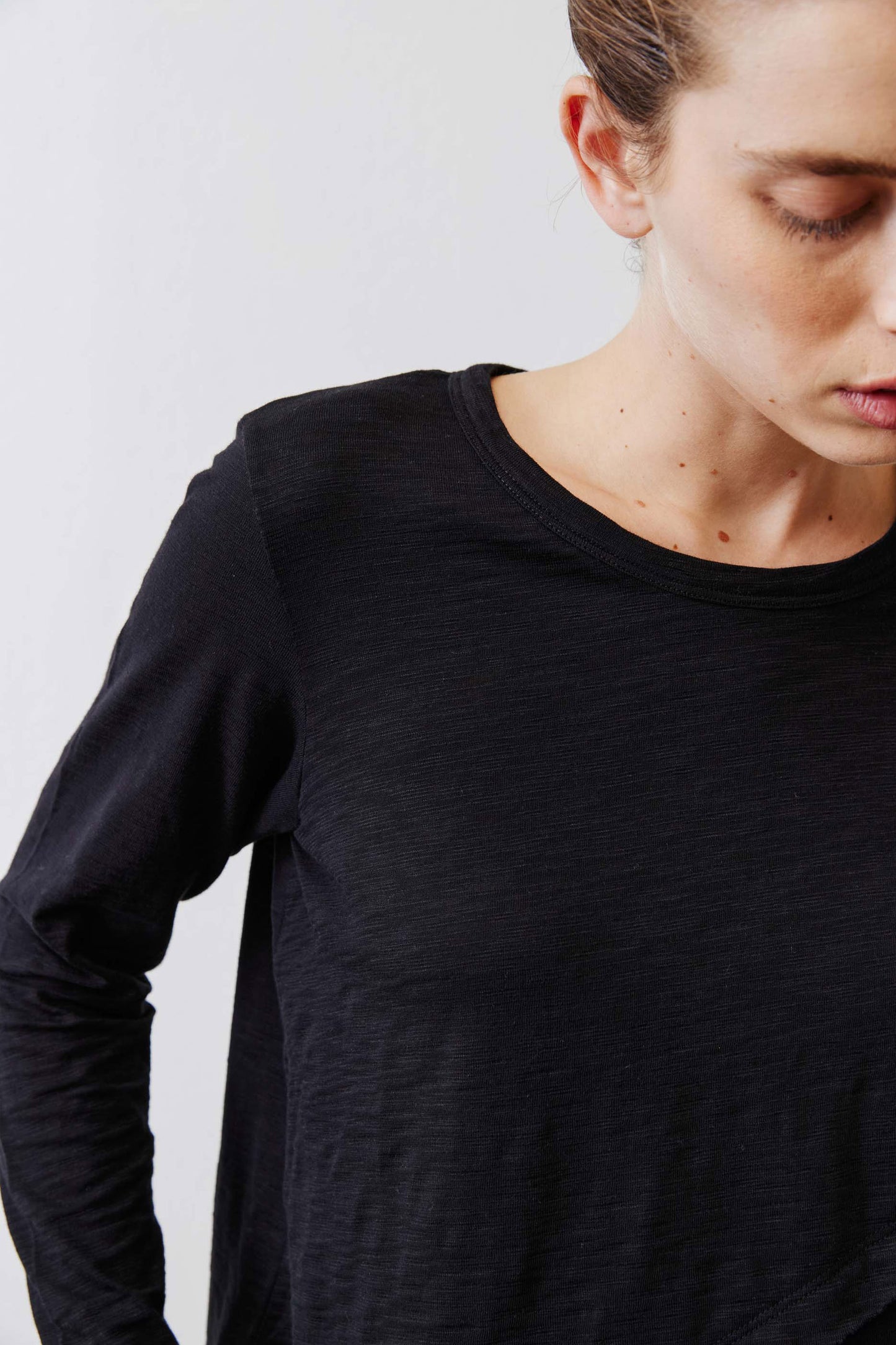 Inner Glow Asymmetric Long Sleeve Top