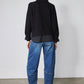 Black pullover sweater shirt, back view with ribbed hem and long sleeves