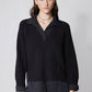 Black knit pullover sweater shirt with collared neckline and long cuffs