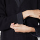 Black knit sweater shirt close-up of button placket and cuff