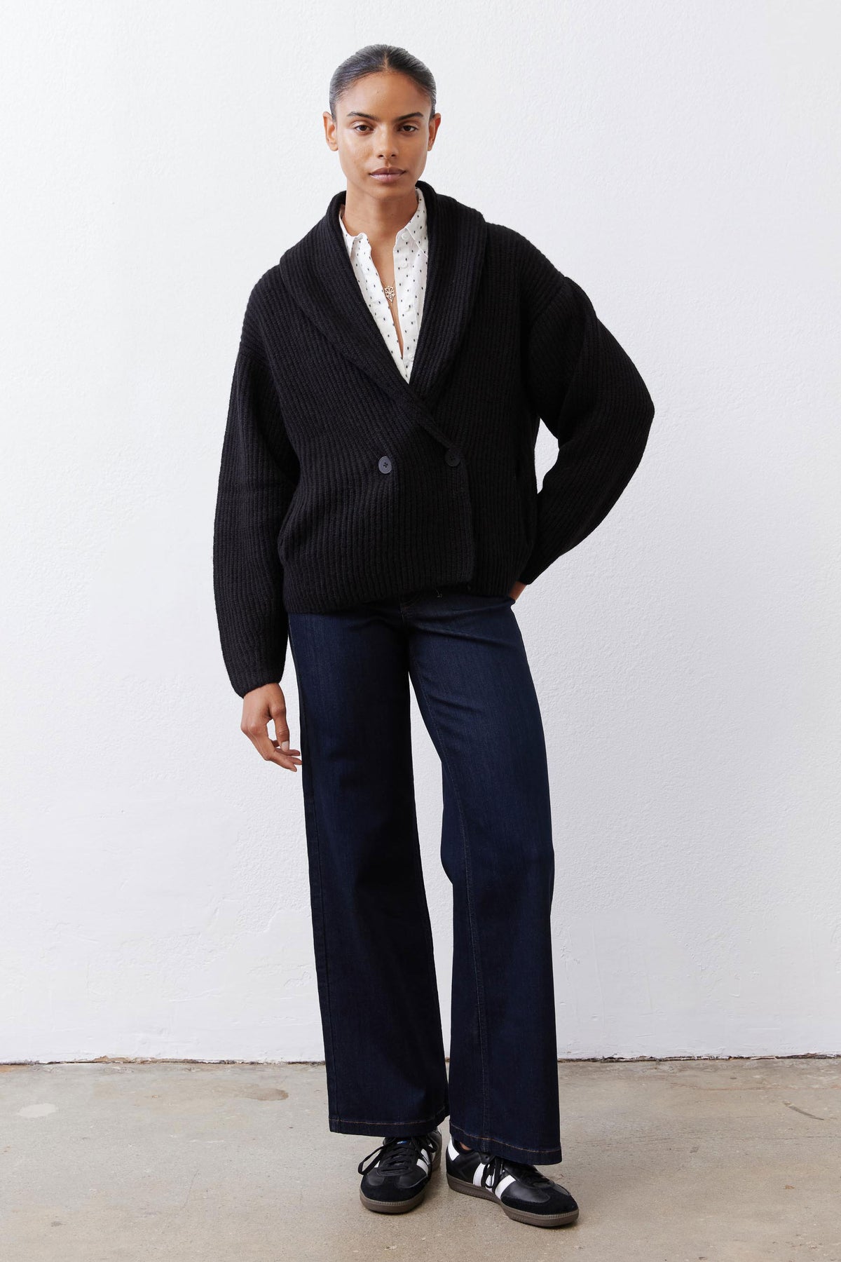 Black rib-knit shawl cardigan with button front and relaxed fit