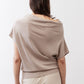 Misty gray short-sleeve sweater back view with draped cowl and ribbed hem