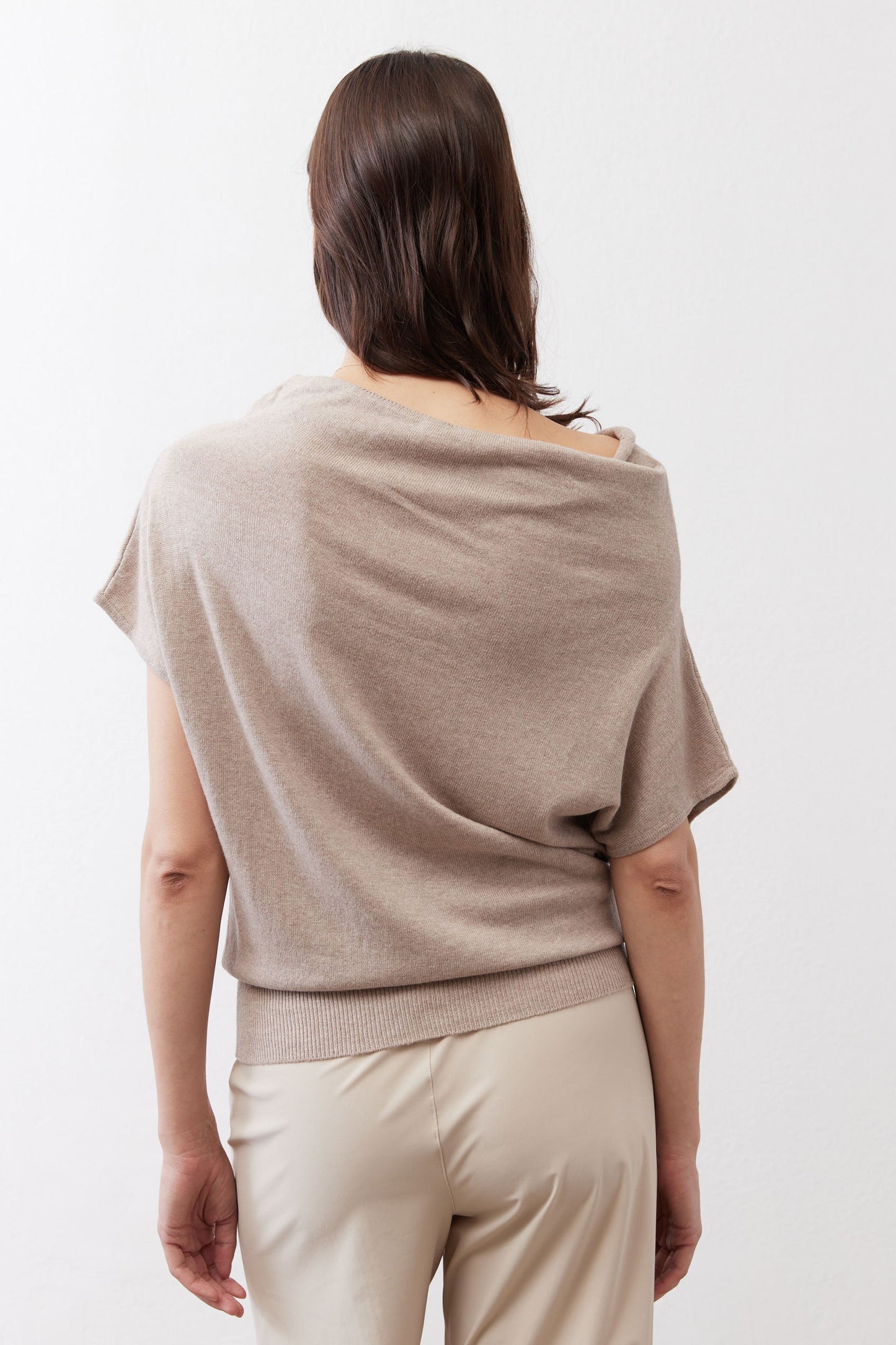 Misty gray short-sleeve sweater back view with draped cowl and ribbed hem