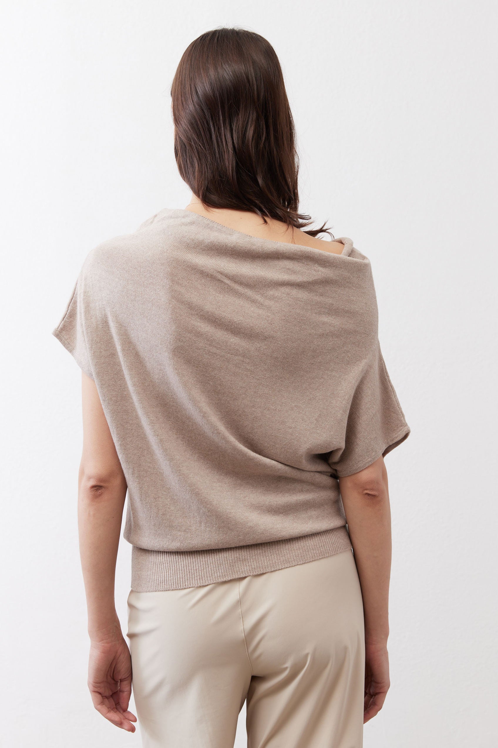 Misty gray short-sleeve sweater back view with draped cowl and ribbed hem