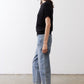Black short-sleeve sweater with draped wide neckline