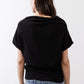 Black short-sleeve sweater, back view with relaxed drape
