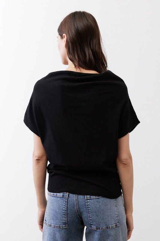 Black short-sleeve sweater, back view with relaxed drape
