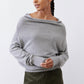 Silver heather knit crewneck sweater with long sleeves, soft drape neckline.