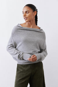 Silver heather knit crewneck sweater with long sleeves, soft drape neckline.