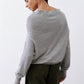 Silver heather knit crewneck sweater, long sleeves, back view showing yoke.
