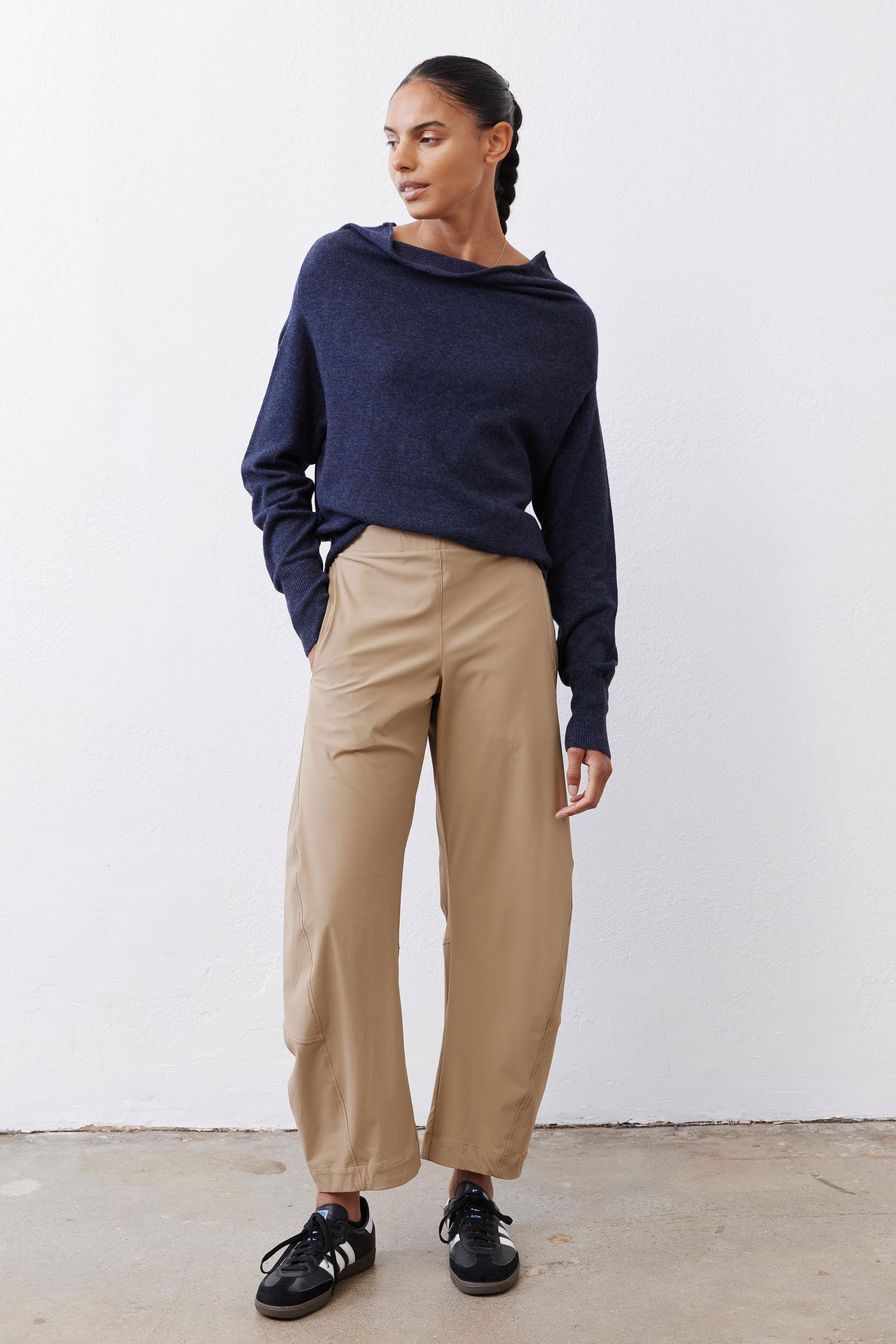 Navy cowl-neck knit sweater with long sleeves and relaxed fit