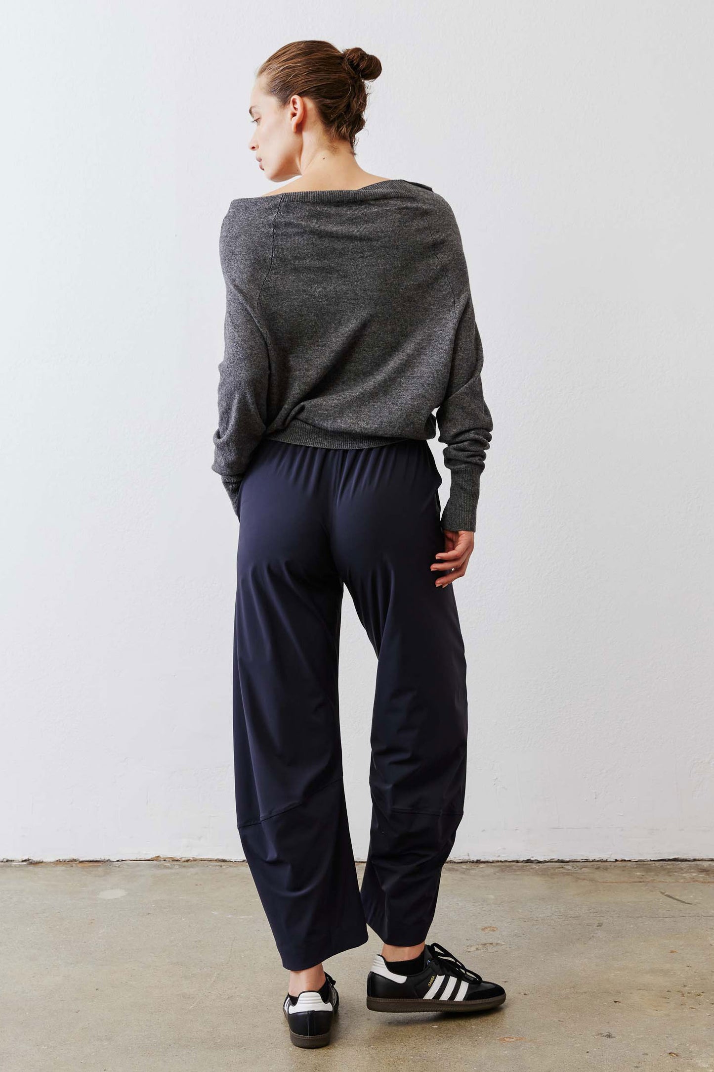 Dark navy work pants, petite, relaxed fit with elastic waistband and ankle length.