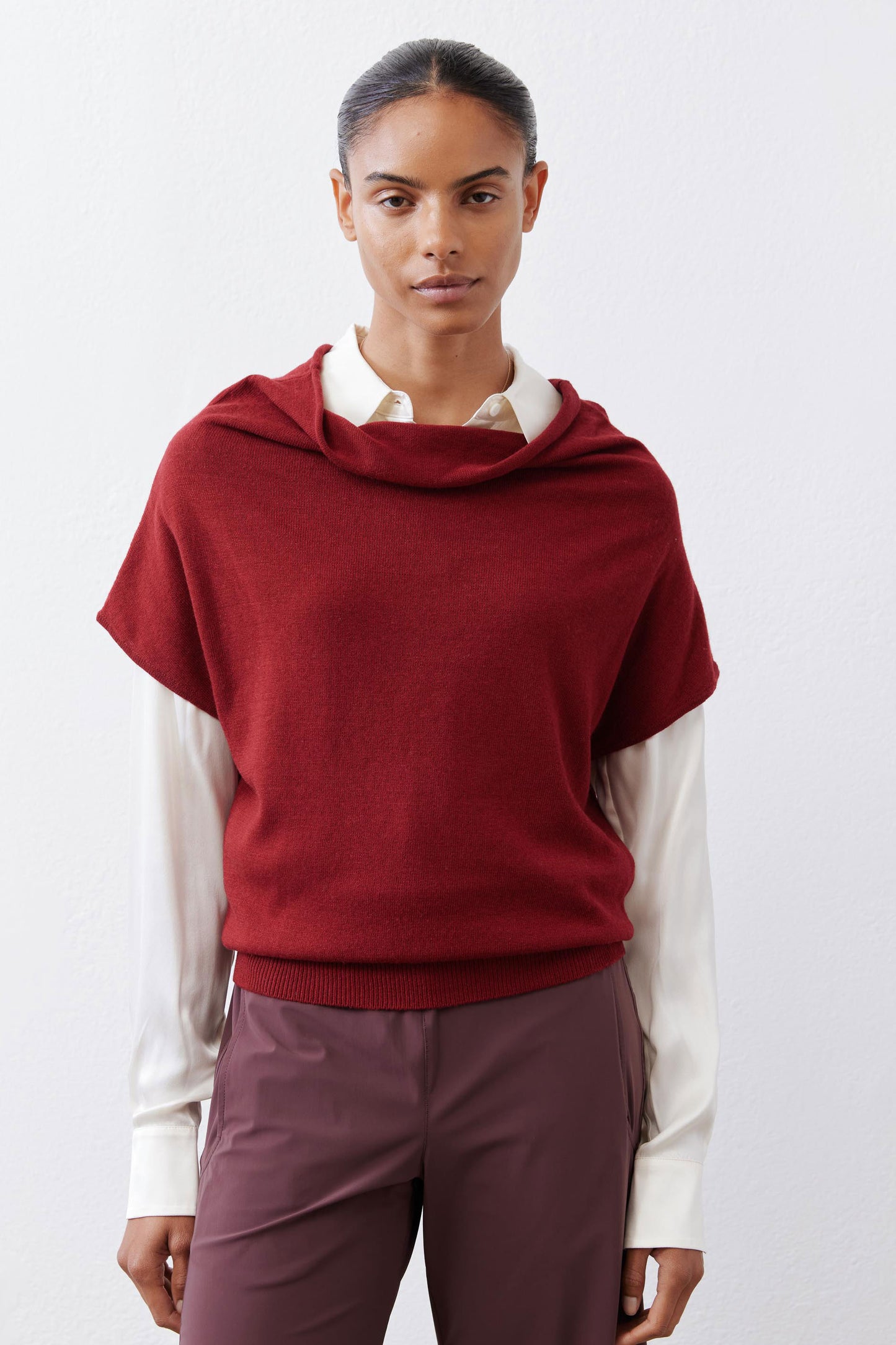 Dark cherry short-sleeve sweater with cowl neck; white long sleeves visible